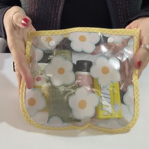 necessaire cristal con flores aplicadas